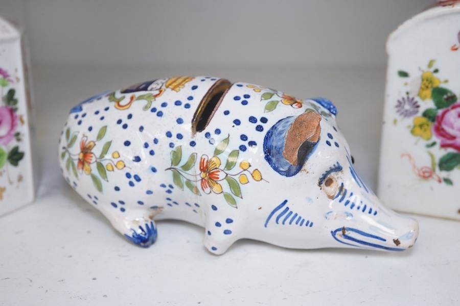 A faience ‘pig’ money bank, and two early 19th century painted lidded jars. Condition - poor, damage to pig.